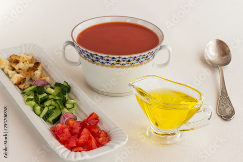 Summer cold tomato soup. Set of products for gazpacho, white background.