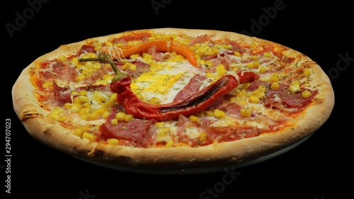 pizza with ham and cheese on plate isolated on white