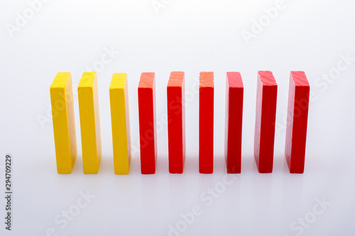 Colorful domino blocks on white background photo