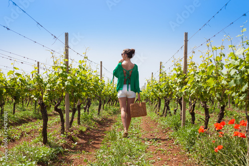 Beautiful woman at a country winery on a summer day. Puglia, Italy photo