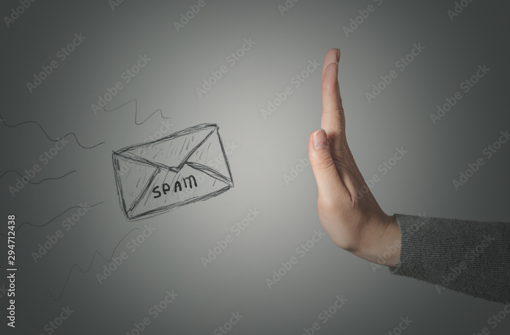 Stop spam concept. Stop gesture by female hand and spam letter on gray background. - obrazy, fototapety, plakaty 