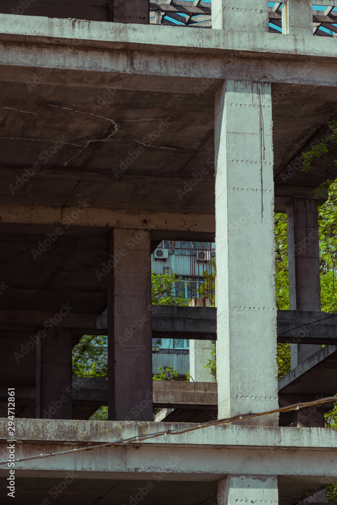 Modern construction site, concrete structure, building under construction, reinforced concrete structure. Construction site concept. Atmospheric background. Modern construction site, concrete structure, building under construction, reinforced concrete structure. Construction site concept. Atmospheric background.