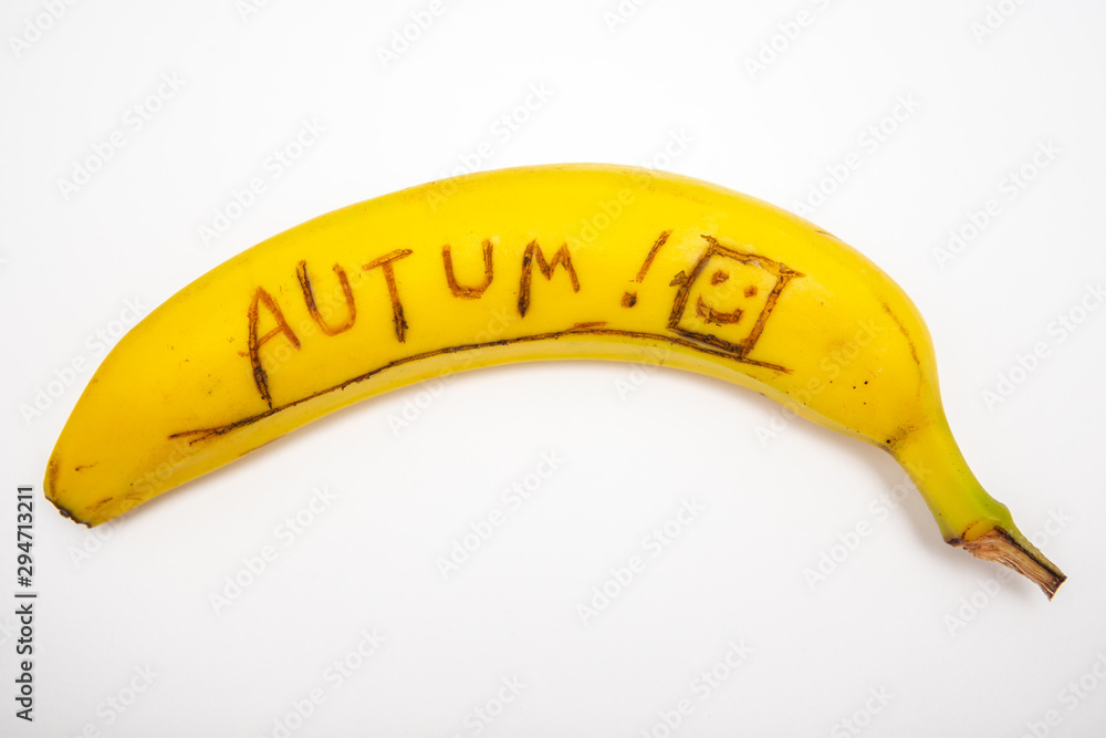 Autumn written on Banana. Autumn background. Autumn written on Banana. Autumn background.