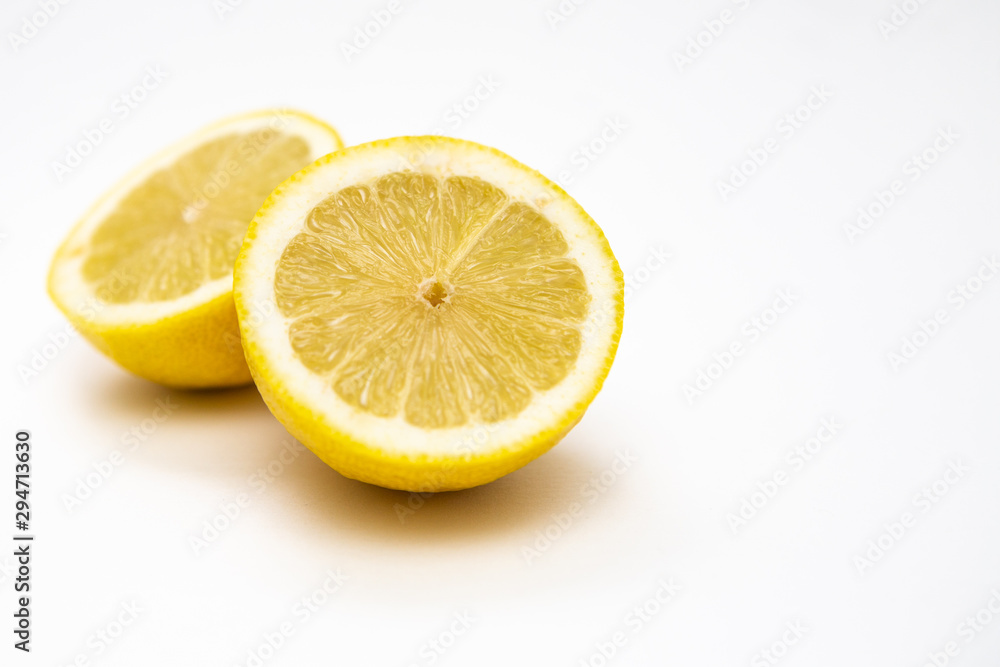  Freshly cut lemon. Sliced ​​lemon on white background.