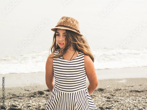 Young girl at the beach photo