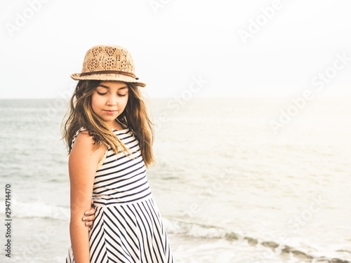 Young girl at the beach photo