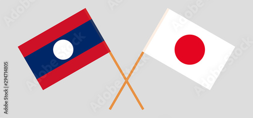 Laos and Japan. Laotian and Japanese flags