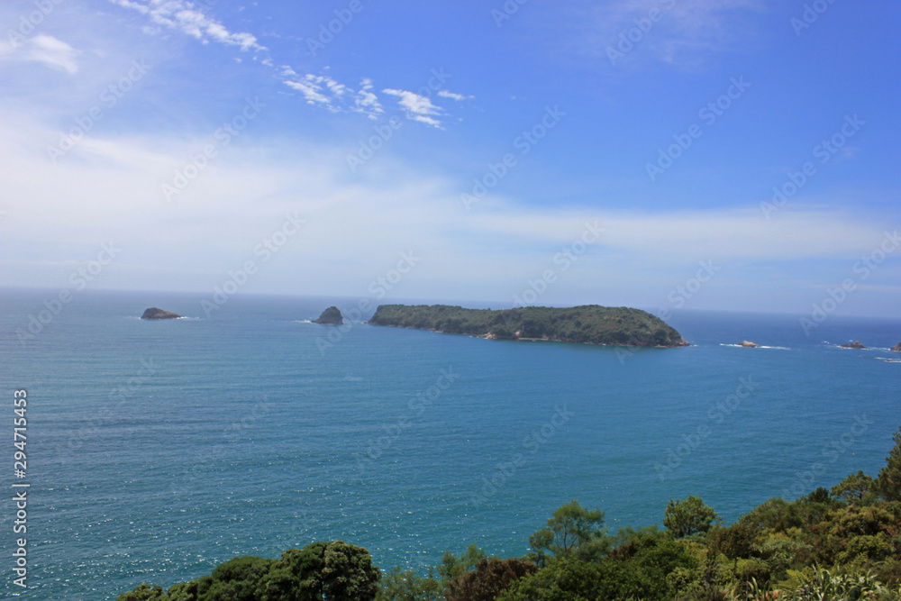 Beautiful view over the blue pacific with islands in the background Beautiful view over the blue pacific with islands in the background