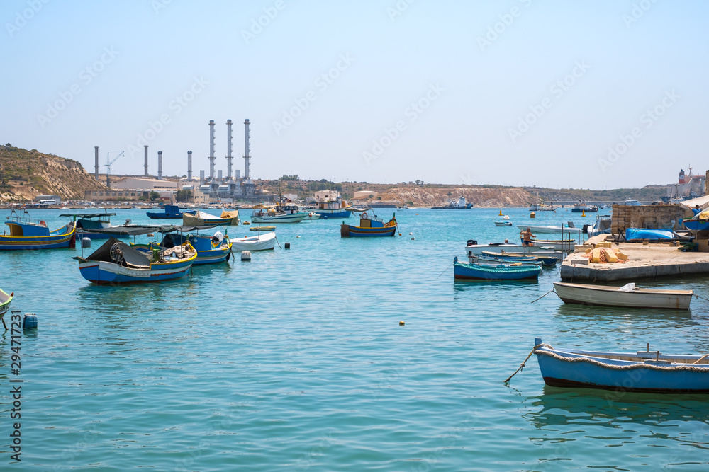 Traditional fishing boats Luzzu moored