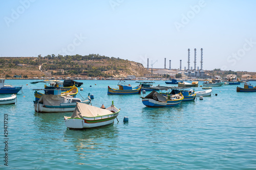 Traditional fishing boats Luzzu moored © Roberto Sorin