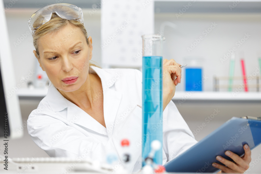 Fototapeta premium woman work with pcr dispenser in the laboratory of genetics