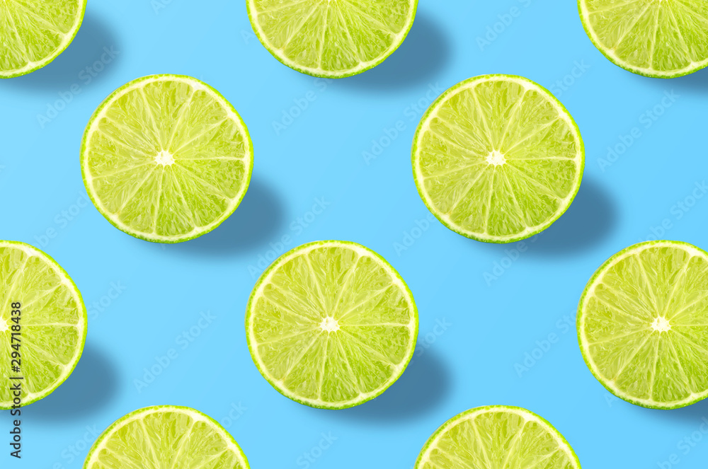 Vivid fruit pattern of fresh lime on colourful background