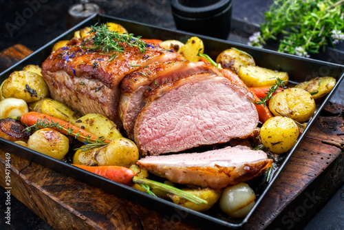 Stampa su tela Traditional roasted dry aged veal tenderloin with carrots and potatoes offered a