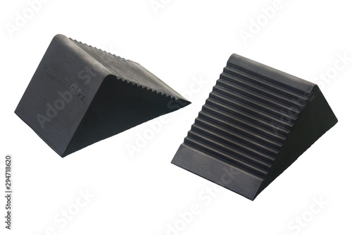 Safety wheel chocks isolated on a white background. They are used for car rollback safety.