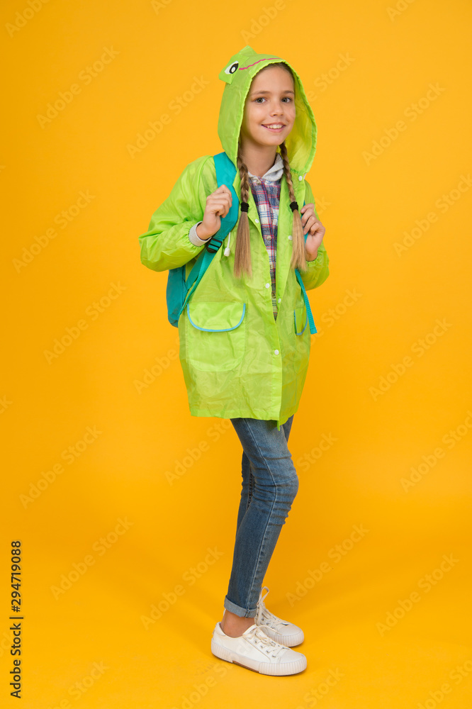 Waterproof cloak. Waterproof fabric for your comfort. Rainproof accessory. Schoolgirl hooded raincoat enjoy rainy weather. Waterproof clothes every kid should try. Kid girl happy wear raincoat Waterproof cloak. Waterproof fabric for your comfort. Rainproof accessory. Schoolgirl hooded raincoat enjoy rainy weather. Waterproof clothes every kid should try. Kid girl happy wear raincoat