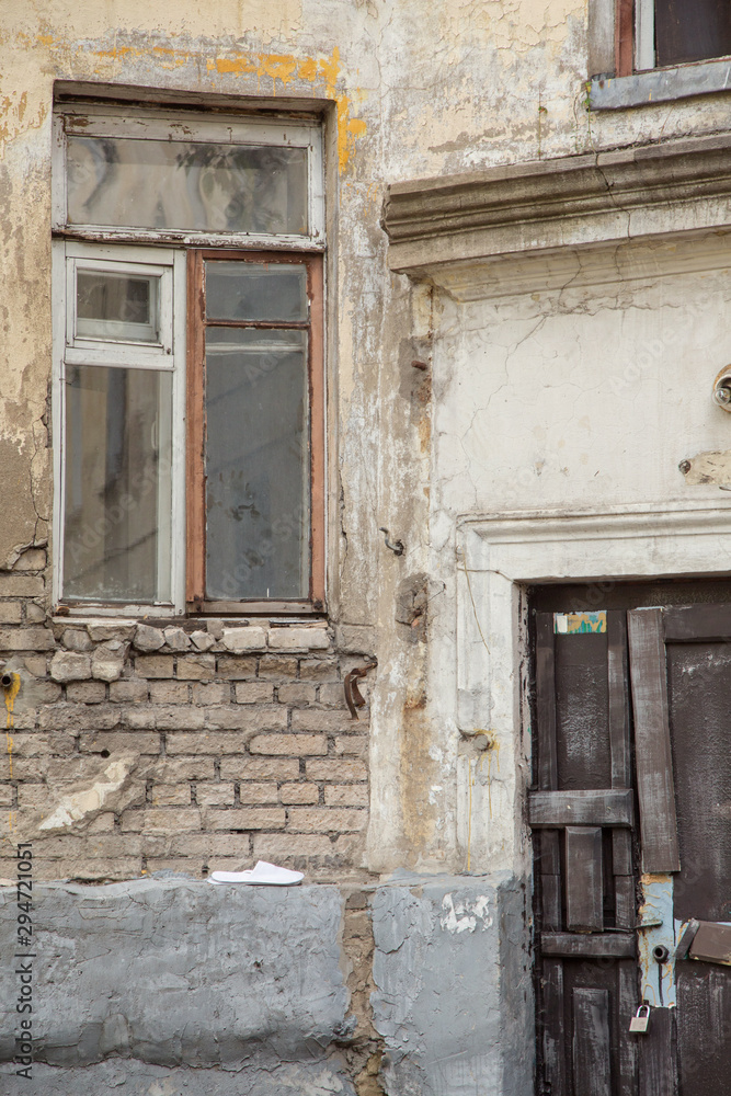 Textured walls and ruins of an old house