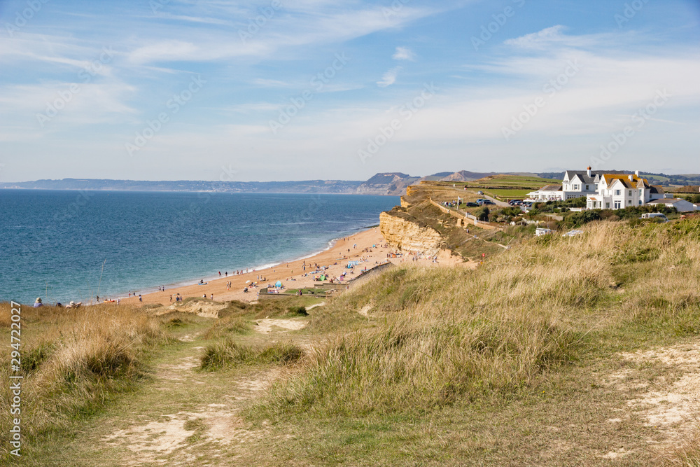 Sunny summer view of Hive beach, part of the greater Chesil beach on the Jurassic coast, in Burton Bradstock, west Dorset, England