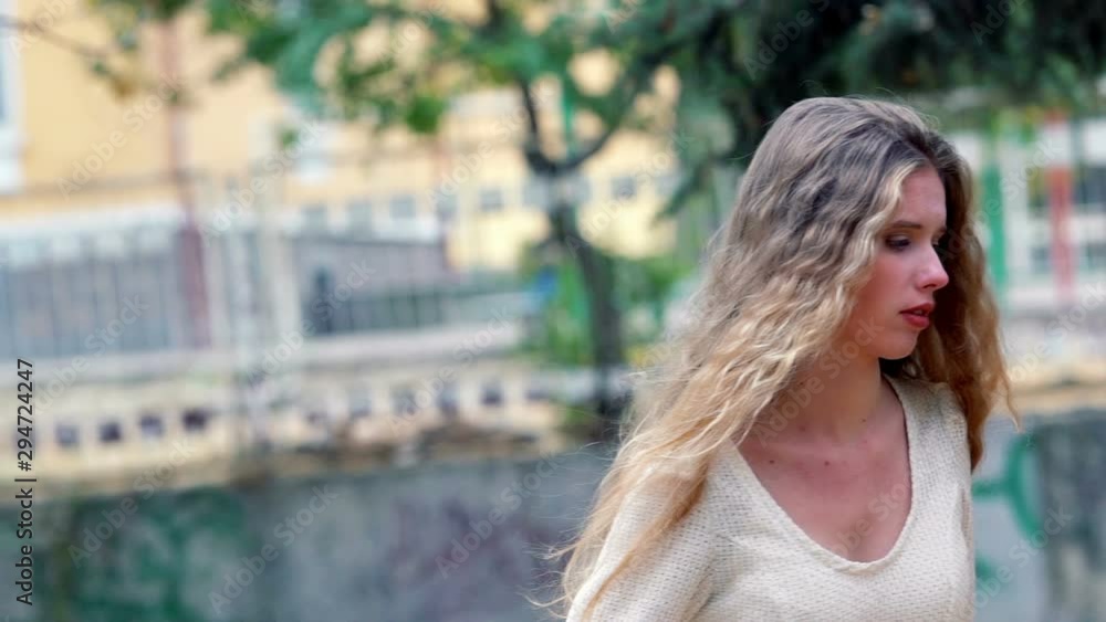 Slow motion of offended girl crying after break up, but then get grip of yourself and calm down and begins to smile and enjoy life and freedom. Slow motion of offended girl crying after break up, but then get grip of yourself and calm down and begins to smile and enjoy life and freedom.