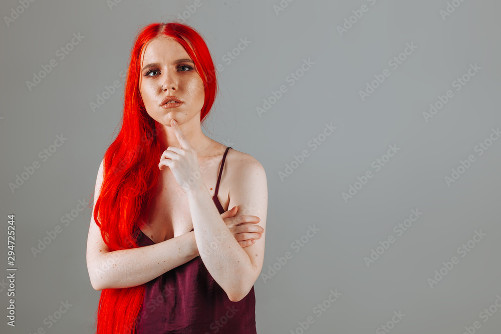 Portrait of a girl with red long hair Portrait of a girl with red long hair