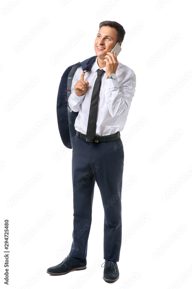 Portrait of handsome young businessman talking by phone on white background Portrait of handsome young businessman talking by phone on white background