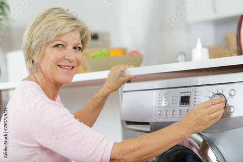 senior woman working in a laudry