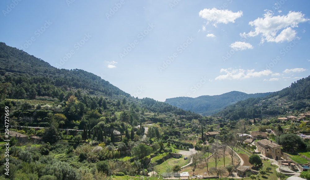 A Beautiful greenish mountains view from a nice viewpoint at the village of Valldemossa in Palma de Mallorca Spain. 