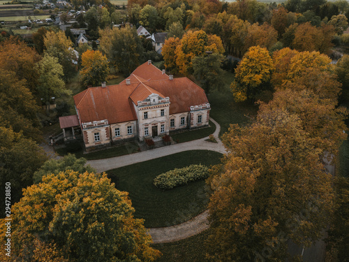 Old and dusty manor at Lithuania from drone perspective, near Joniskis.
