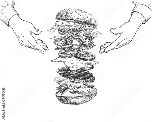Chef hands and burger ingredients
