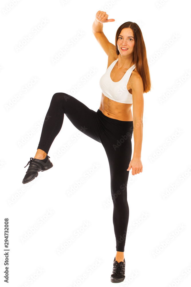 Sexy fitness woman posing in studio - isolated on a white background Sexy fitness woman posing in studio - isolated on a white background