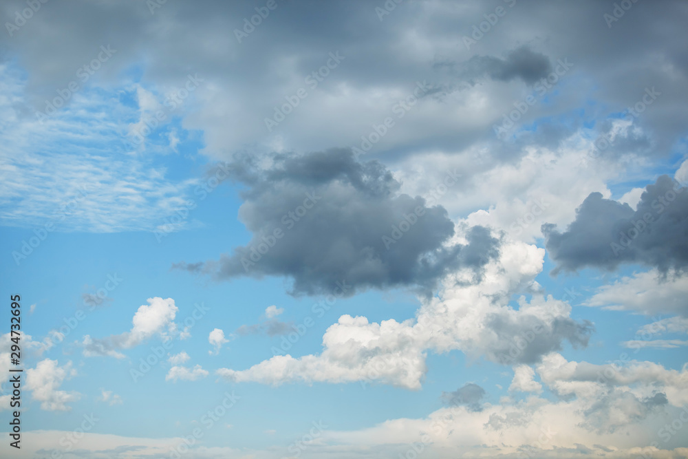 blue sky with white and gray clouds blue sky with white and gray clouds