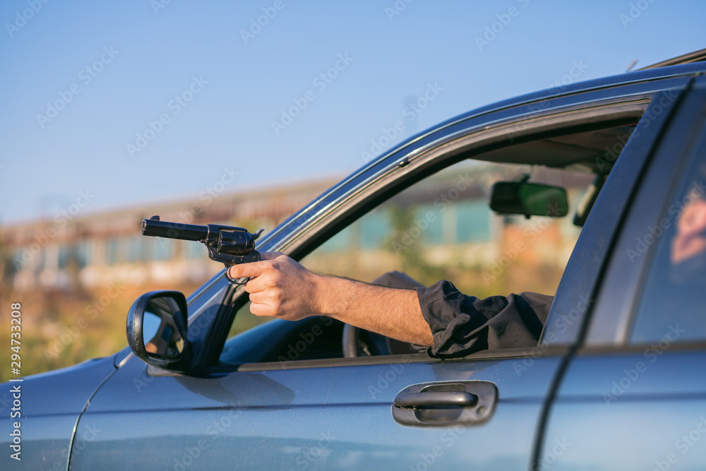 criminal discharging a gun through a window of a moving car criminal discharging a gun through a window of a moving car