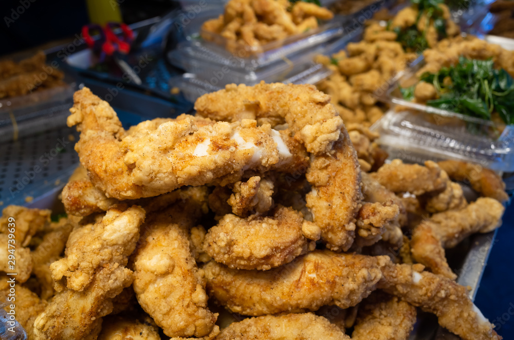 taiwanese fried chicken on a plate in the street taiwanese fried chicken on a plate in the street