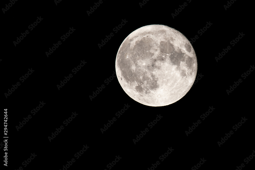 Fototapeta premium Full moon over black night sky.For background use