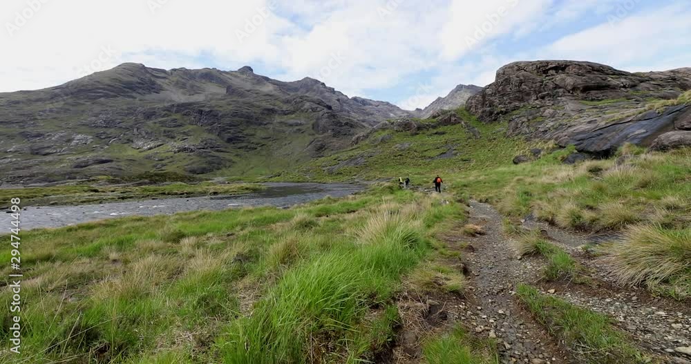 Traveler walk against beautiful Scotland nature. Traveler walk against beautiful Scotland nature.
