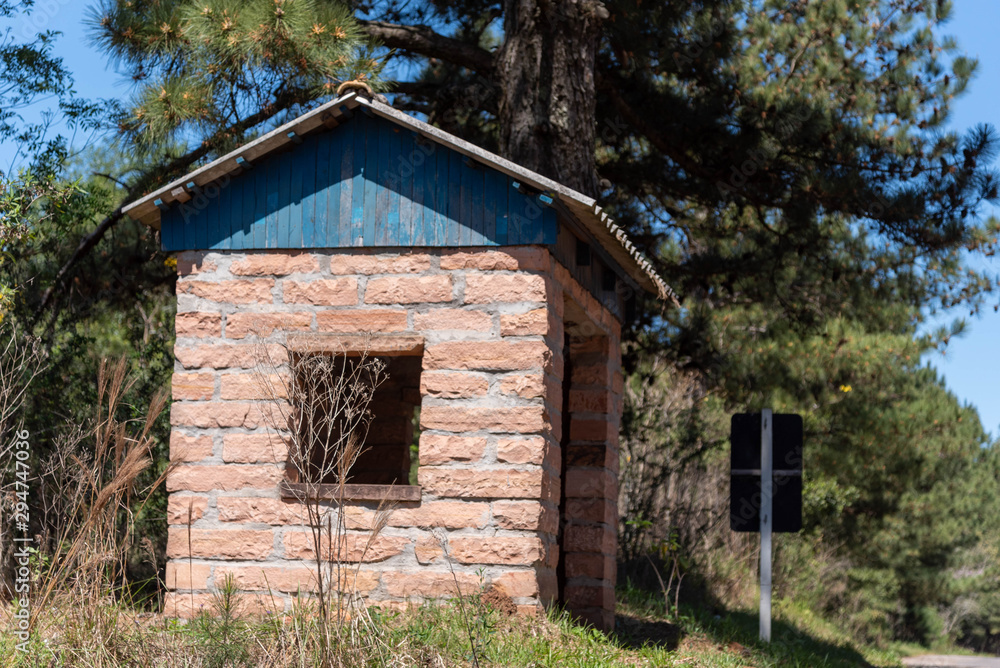 Small bus stop built in stone Small bus stop built in stone