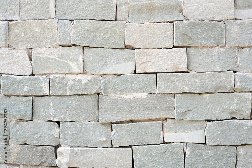 Obraz premium Old gray sand stone wall texture background. floor