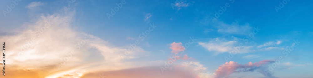 Obraz premium Panorama of Dramatic vibrant color with beautiful cloud of sunrise and sunset. Panoramic image.