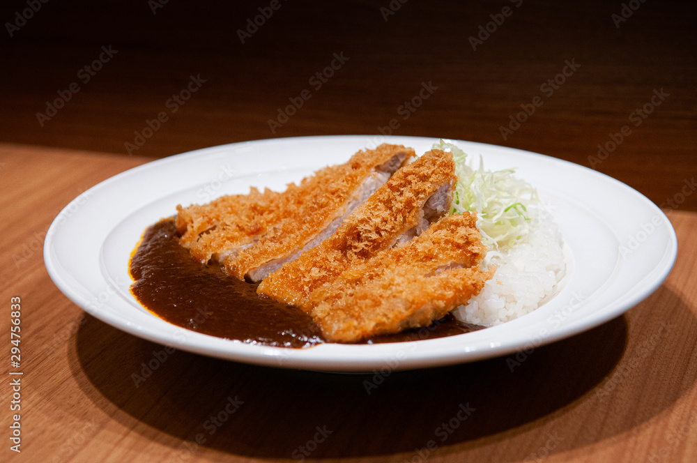 Crispy fried pork cutlet with curry and rice - Japanese food style Crispy fried pork cutlet with curry and rice - Japanese food style