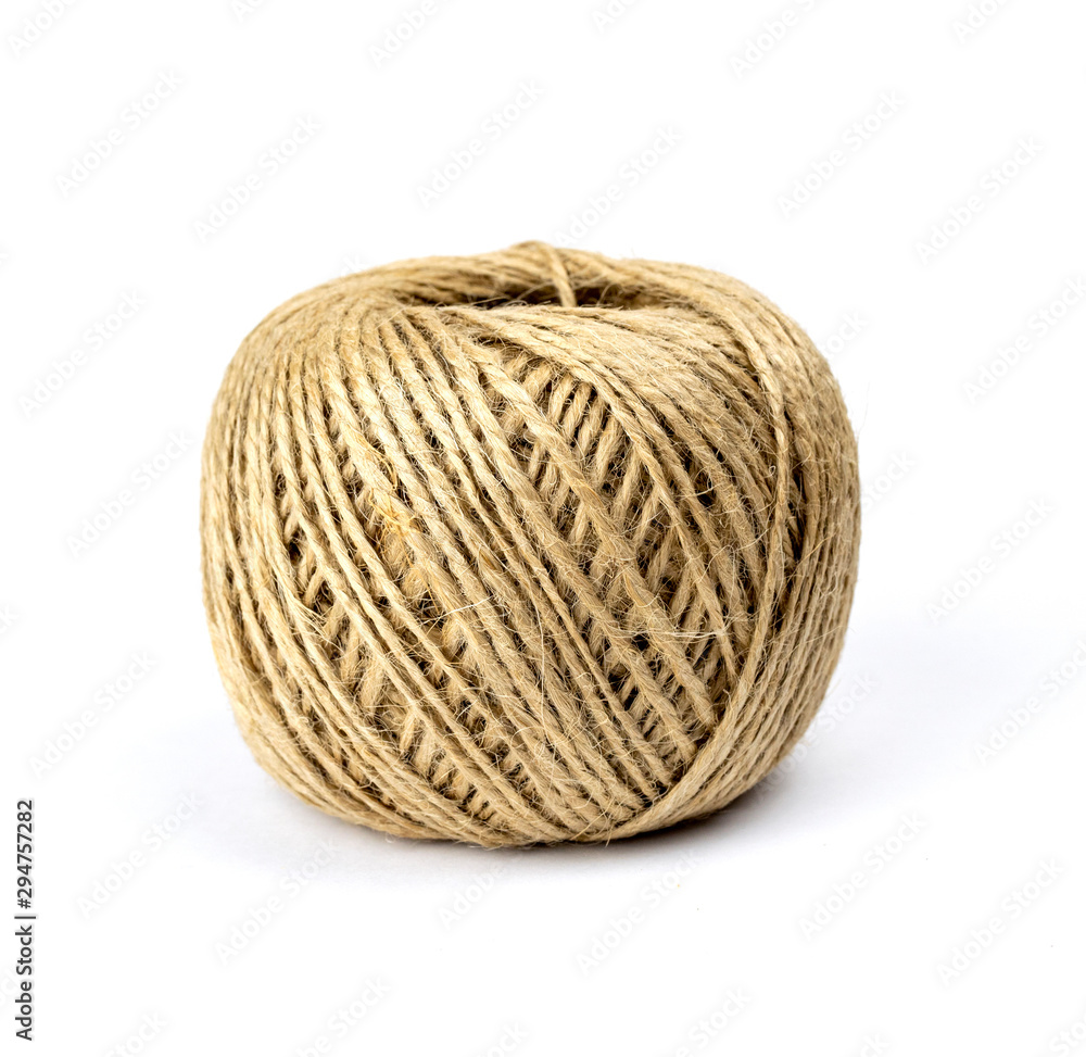 Skein of jute twine threads isolated on white background. Natural fiber for work and creativity Skein of jute twine threads isolated on white background. Natural fiber for work and creativity