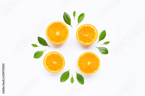 Fresh orange citrus fruit with leaves isolated on white background.