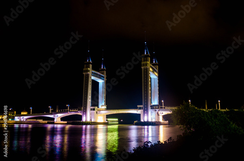 Kuala Terengganu iconic drawbridge light up at night. © Amirul