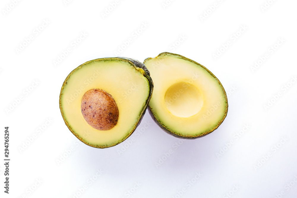 Avocado isolated on white. Fresh and green