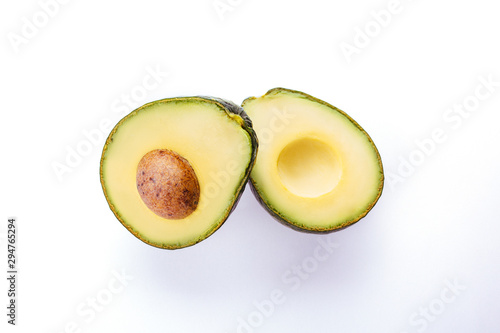 Avocado isolated on white. Fresh and green