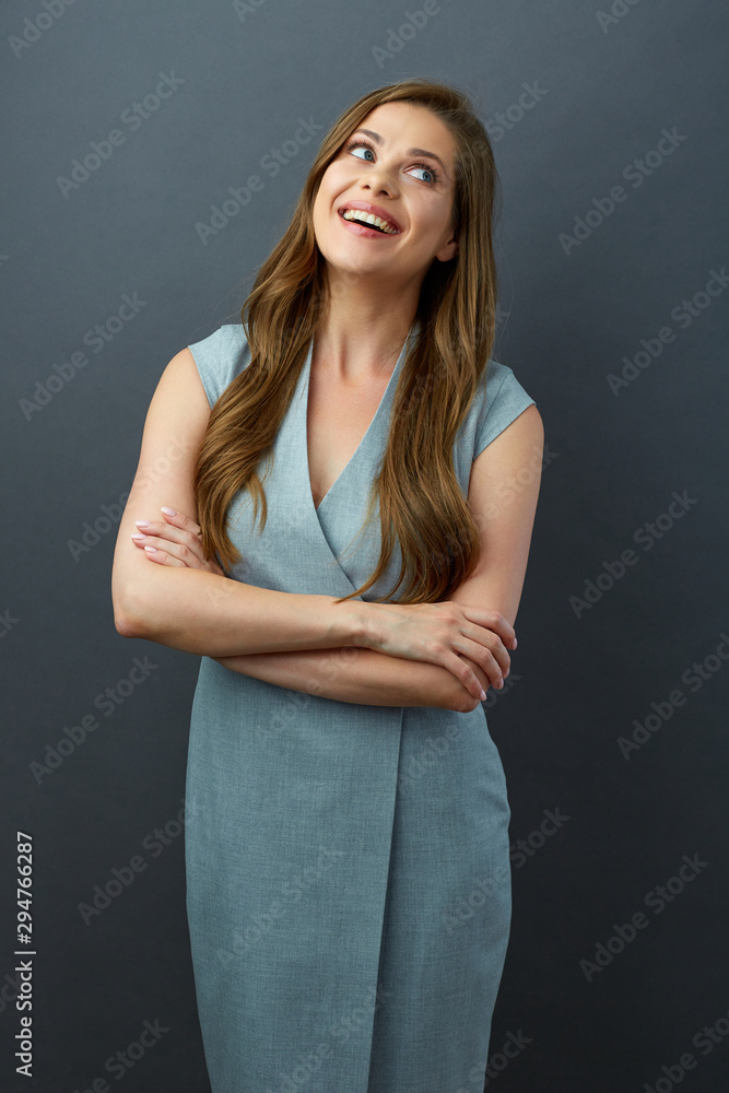 Happy woman with crossed arms, long hair and toothy smile. Happy woman with crossed arms, long hair and toothy smile.