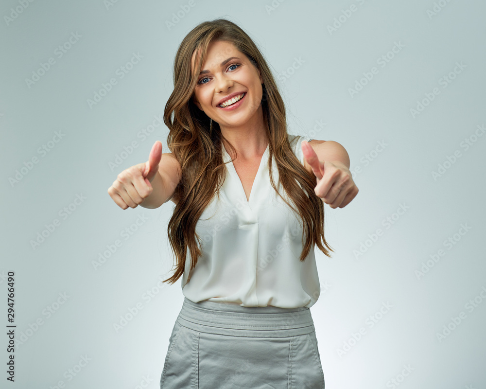 Smiling woman shows thumb up. Smiling woman shows thumb up.