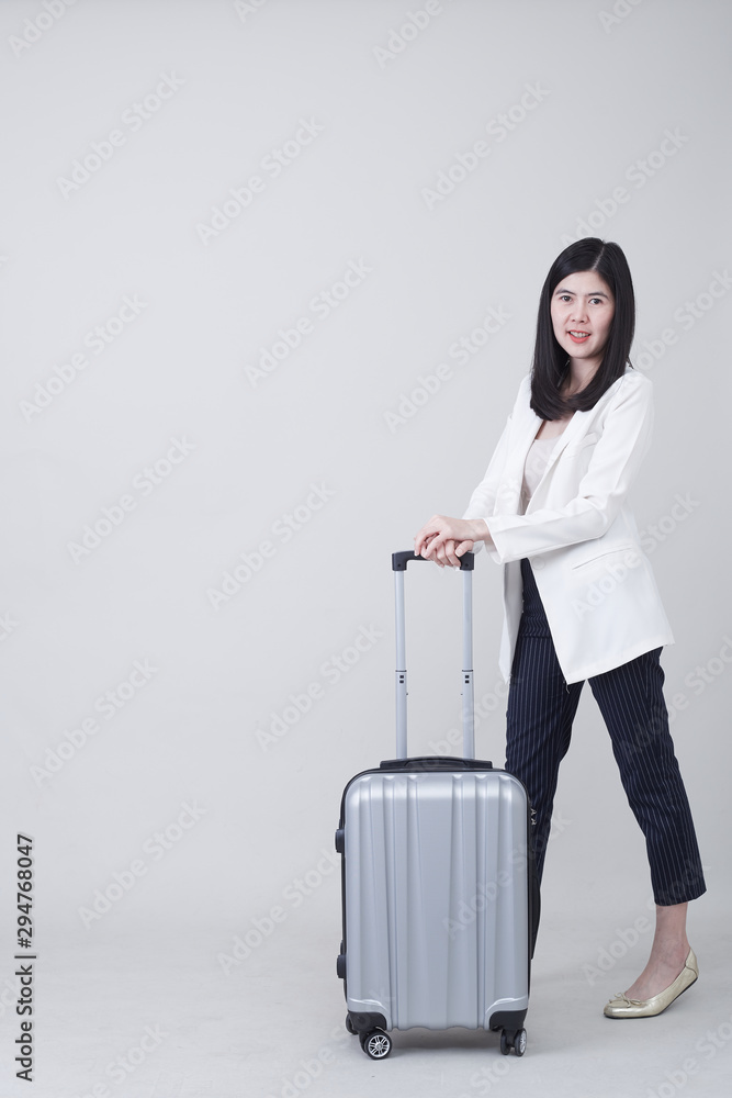 Young Asian woman tourist with luggage to travel Young Asian woman tourist with luggage to travel