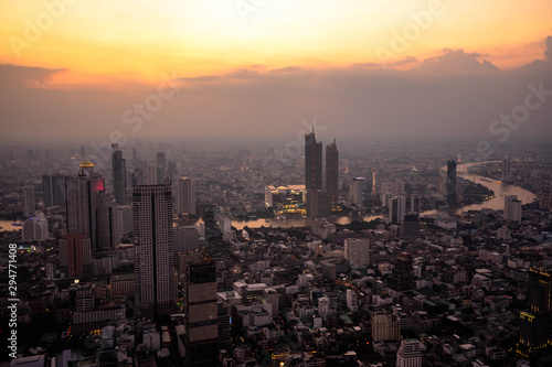 Bangkok, Thailand - September 27 2019: Panoramic view of the Bangkok city Located at the top of King Power Mahanakhon Building with The sky and sun at sunrise nature background.