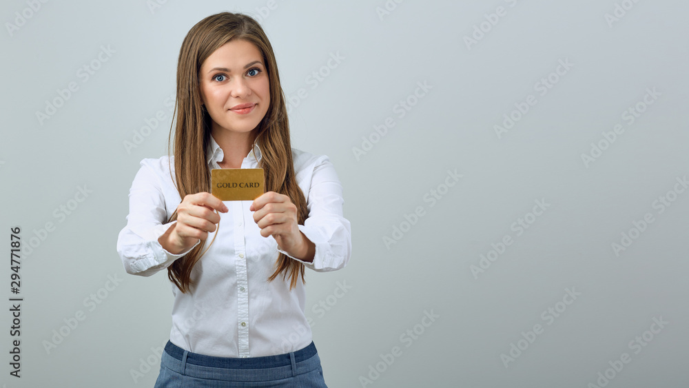 Female bank employe holding golden credit card Female bank employe holding golden credit card