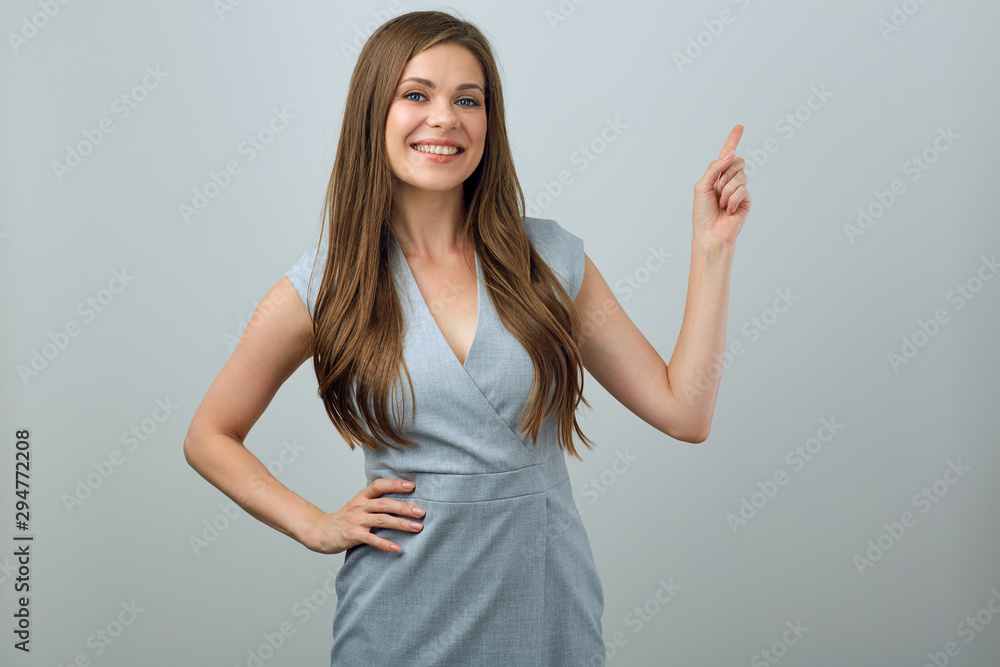 Beautiful businesswoman pointing finger. Beautiful businesswoman pointing finger.