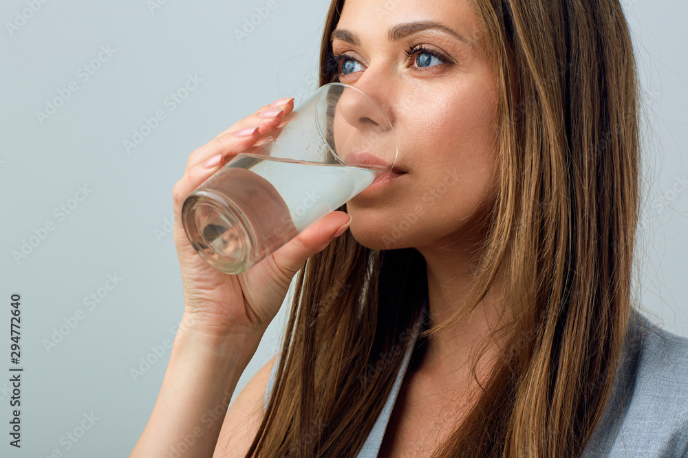 Close up face portrait drinking water from glass. Close up face portrait drinking water from glass.